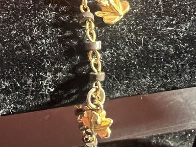Gold Tone Leaf Charm Bracelet with Black Accents - Fashion Jewelry