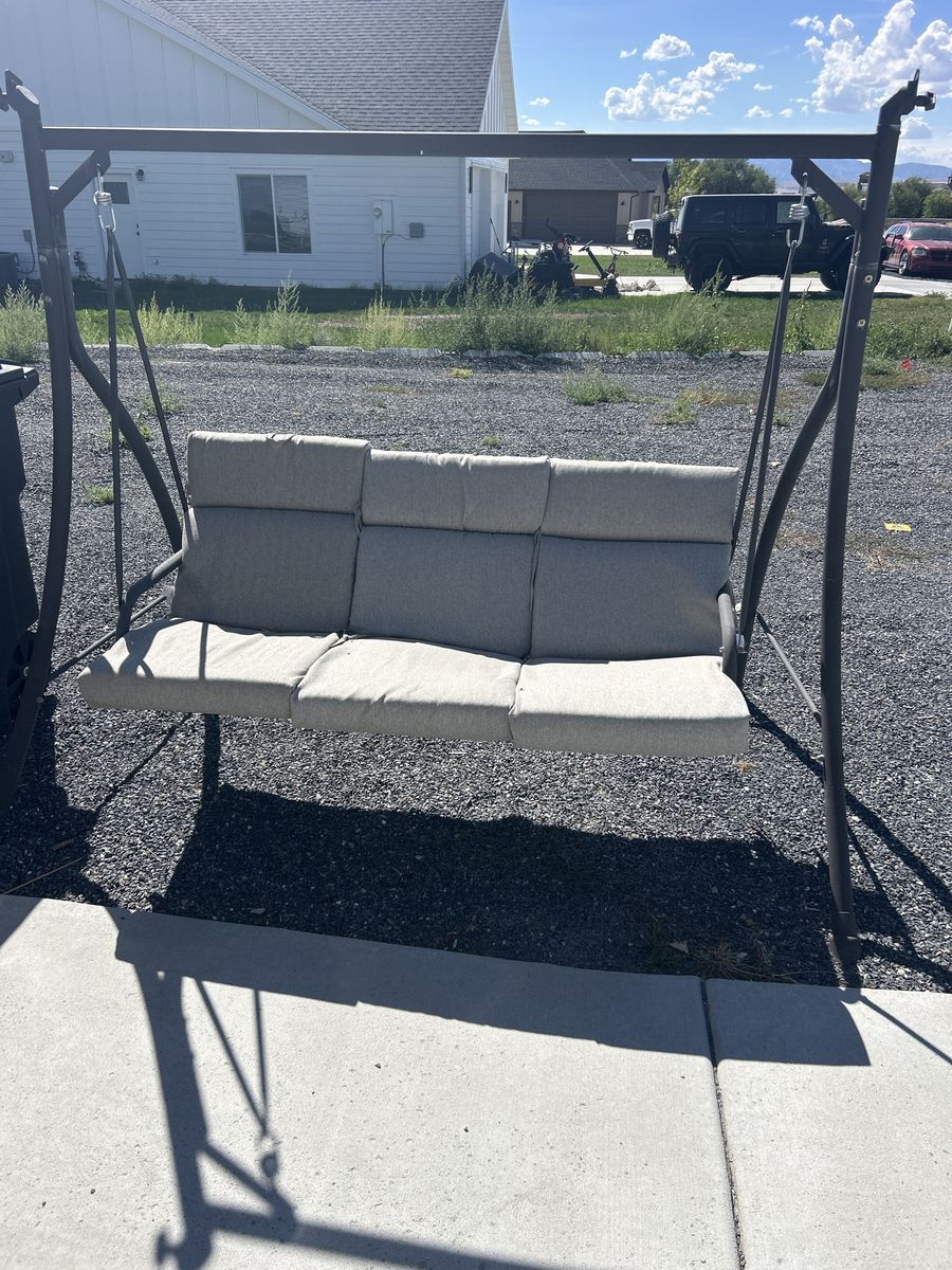 Outdoor Metal Patio Porch Swing with Cushions no canopy.