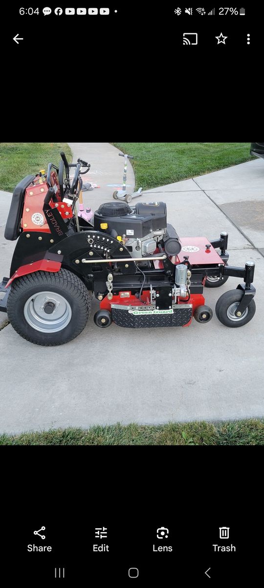 Bradley Mowers 36" commercial stand on rider with added Green Guard chute blocker system