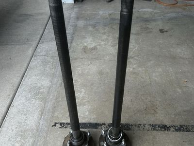 OEM 2007–2018 Jeep Wrangler JK with a Dana 44 rear axle shafts (32 spline)
