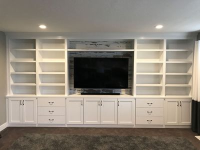 CUSTOM ENTERTAINMENT CENTERS, BOOKCASES, DESKS, ORGANIZERS, CABINETRY