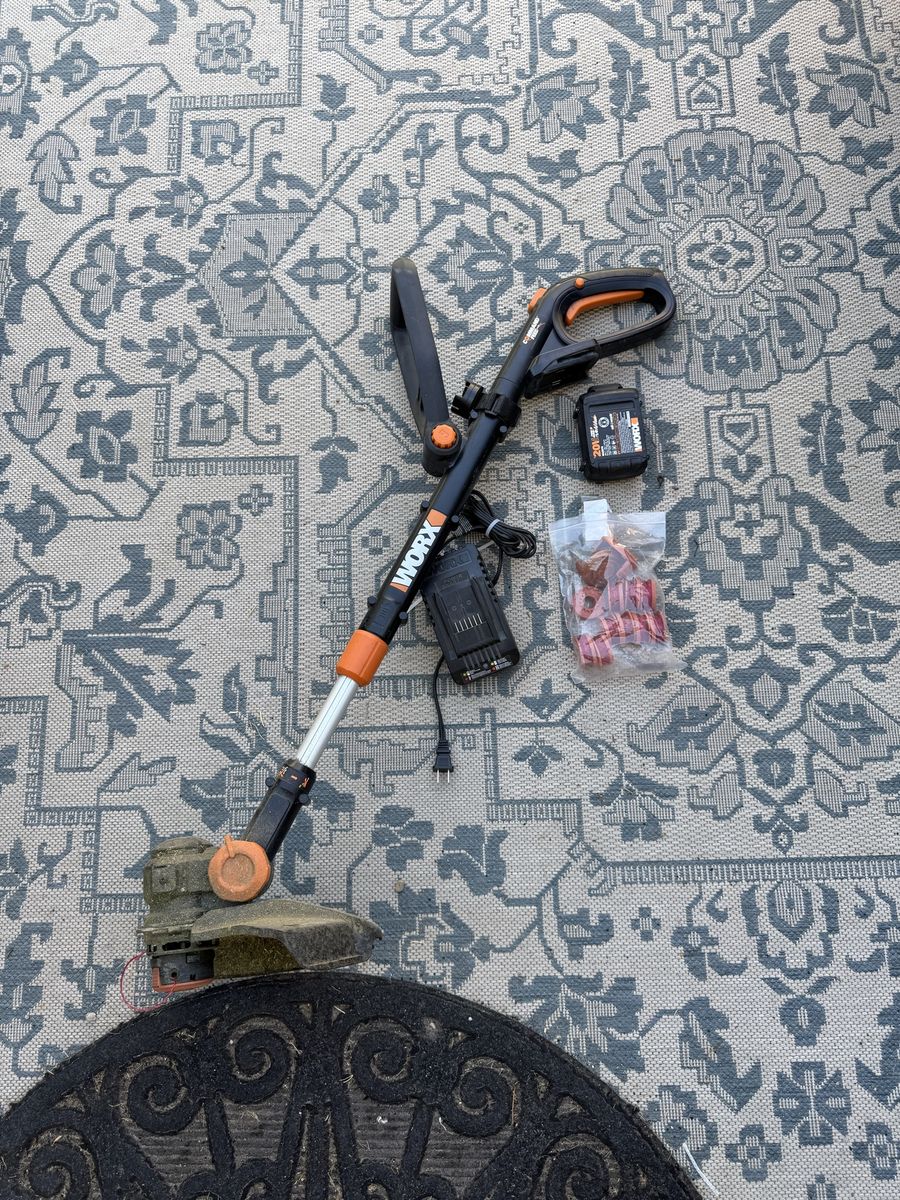 Worx weed eater with battery charger charger and line