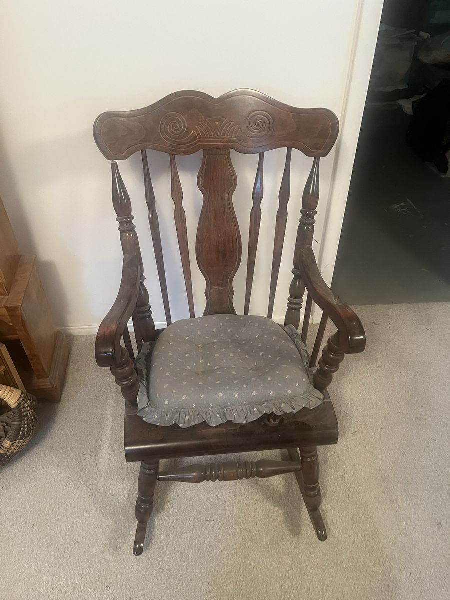 Vintage Wooden Rocking Chair with Carved Back and Seat Cushion