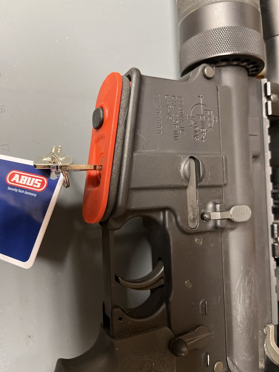 AR 15 firearm lock. Abus Security-Tech Germany FTS Gun Lock - Red, w/ Keys & Code Card.
