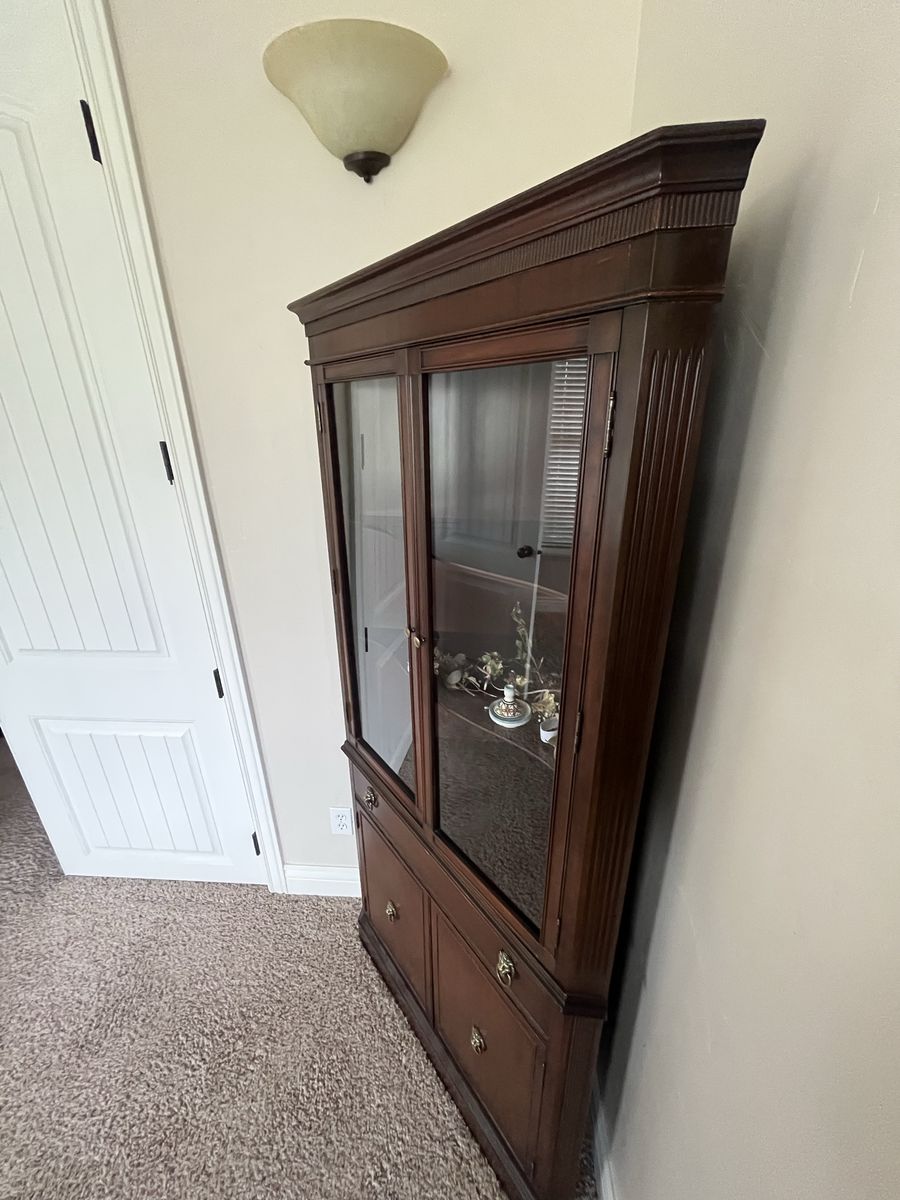 Moving need to sell. Beautiful cherry wood, Looking, China, cupboard, for dishes, antiques, or collectibles, check pictures for