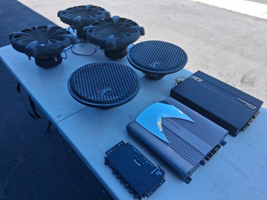 3- Kicker 12 in. CompVR, Cast Grilles 2- Kicker IMP 12 in. Steel Grilles subs, Kicker KQ5 EQ, MTX Thunder 2300x and Acoustik Amp