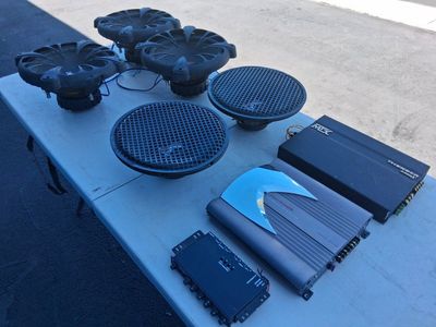 3- Kicker 12 in. CompVR, Cast Grilles 2- Kicker IMP 12 in. Steel Grilles subs, Kicker KQ5 EQ, MTX Thunder 2300x and Acoustik Amp