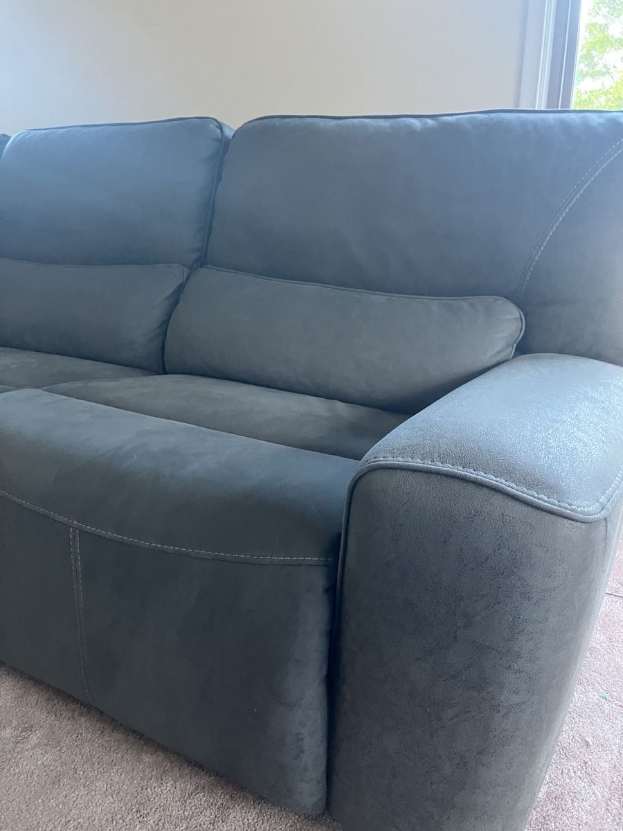 Sectional couch with three power recliners and head rests
