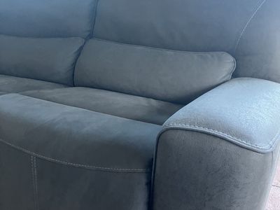 Sectional couch with three power recliners and head rests
