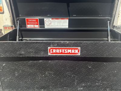 Black craftsman in bed tool box