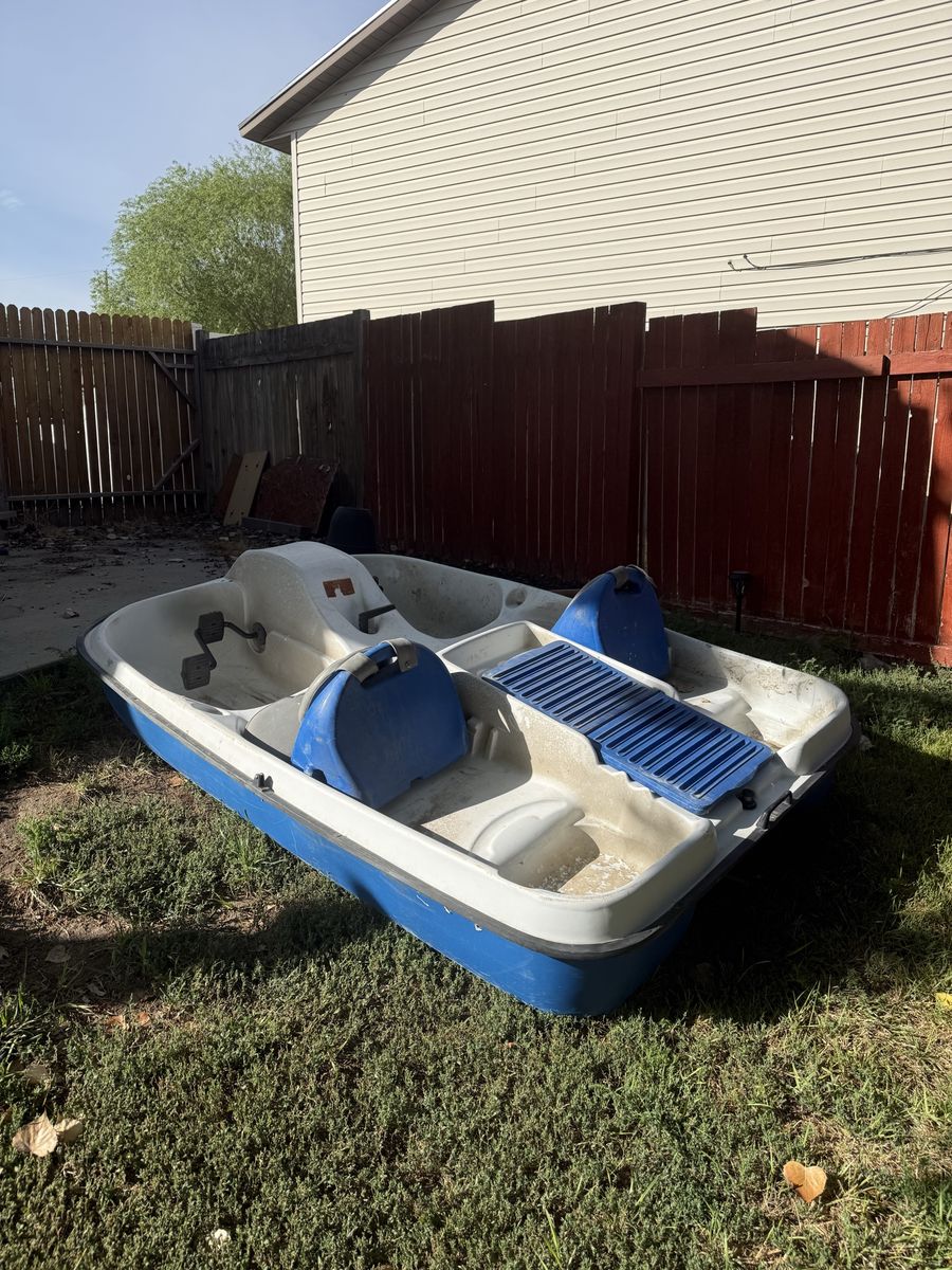Used Blue and White Pedal Boat Without Motor