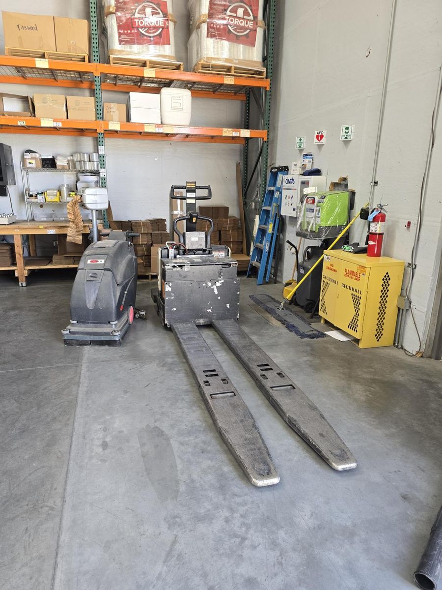 Electric pallet jack with charger