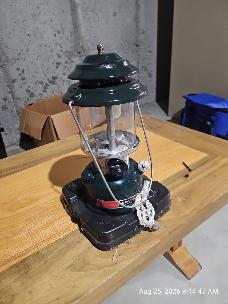 Vintage Coleman dual-mantle lantern Model 2884700 with red plastic carrying case