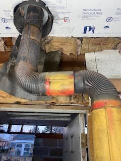 Wood burning box stove with stove pipes