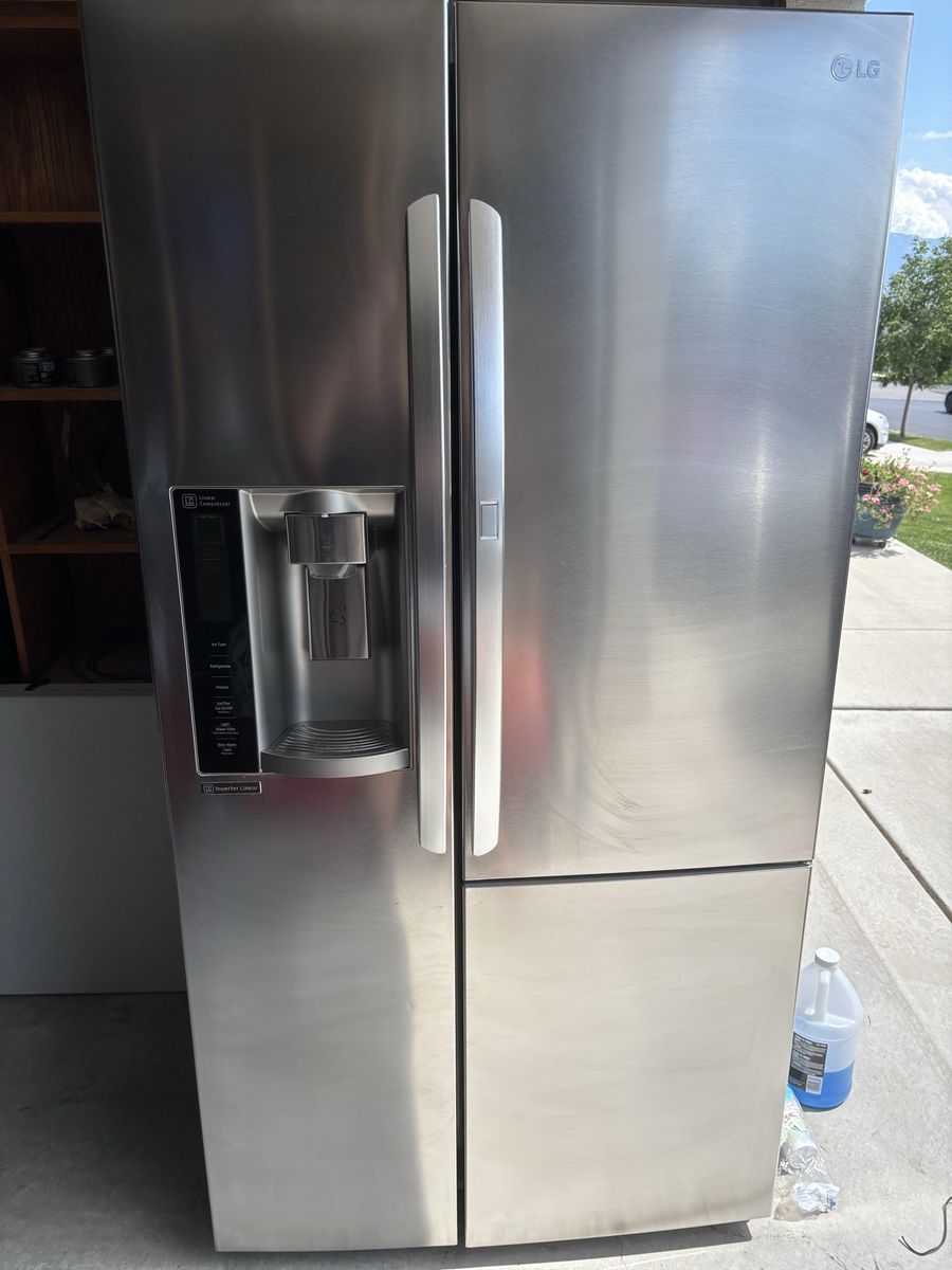 LG Stainless Steel Side-by-Side Refrigerator with Water Dispenser