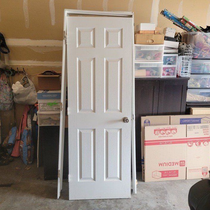 Used White Interior Door - 6-Panel Design. Door Knob, Hinges, and Frame Included