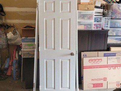 Used White Interior Door - 6-Panel Design. Door Knob, Hinges, and Frame Included
