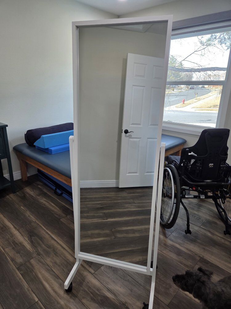 Mirror on stand with wheels