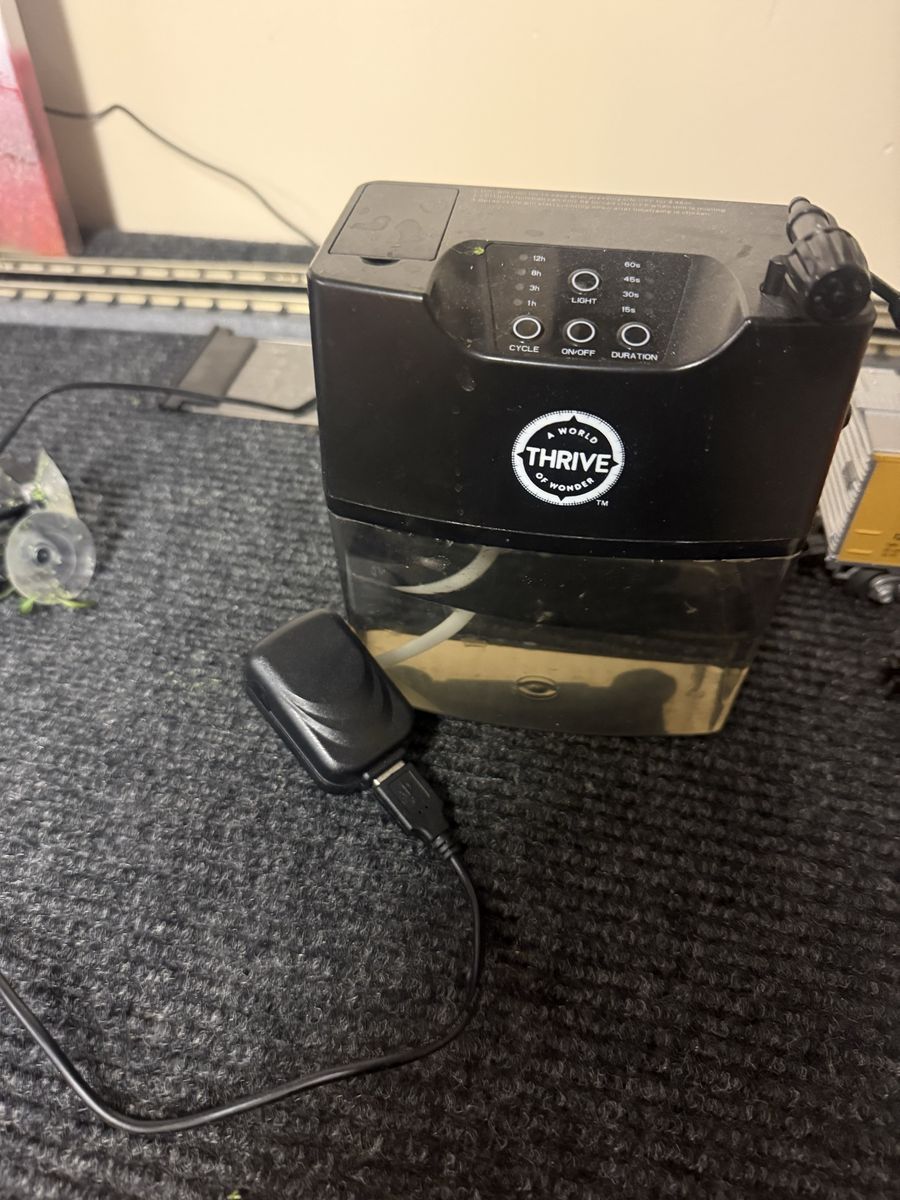 A World Of Wonder Thrive Hydroponic System mister used only got it to turn on never used it once because I didn’t set up my tank