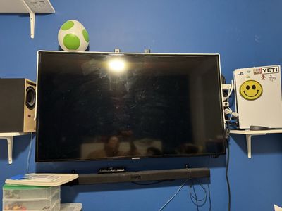 Samsung 50-inch Smart TV with Remote - Used, Good Condition includes wall mount. OBO