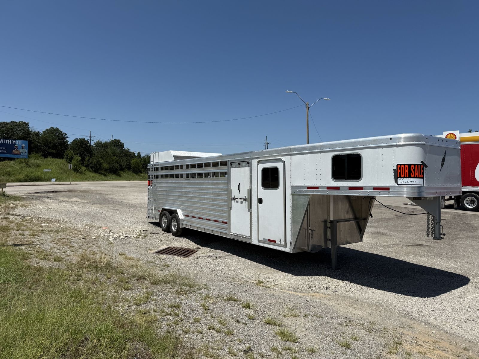 2025 38 foot feather light custom built 8 foot wide, saddle, tack room in the front