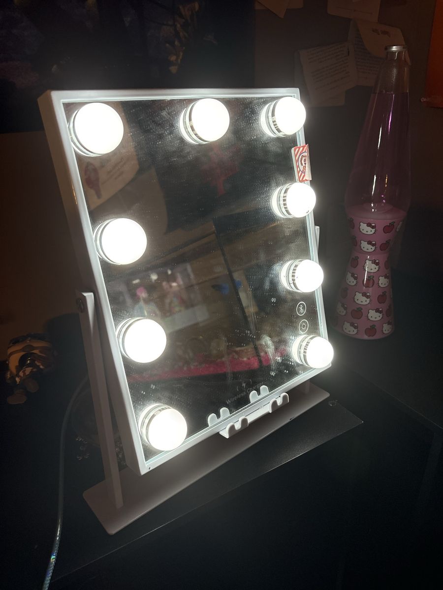 Bluetooth light-up phone charging mirror
