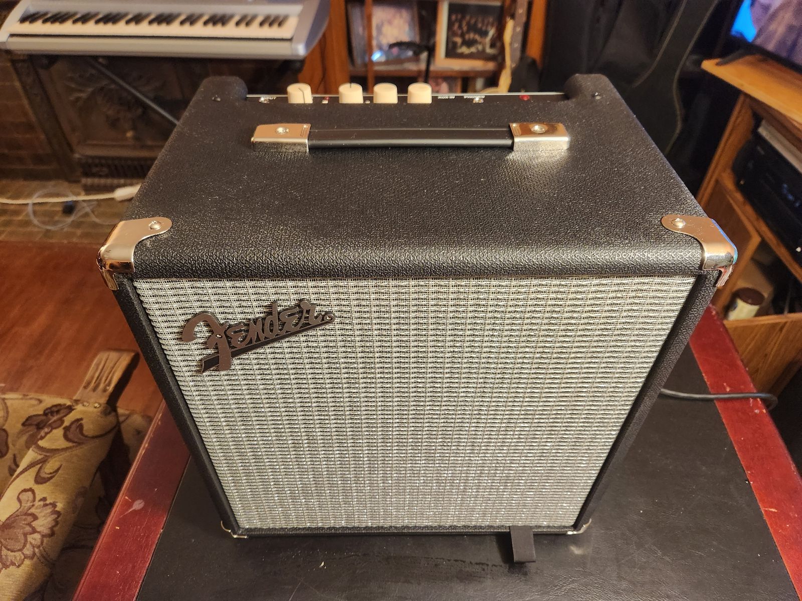 Larger sized Fender "Rumbler 25",  70 watt guitar amplifier with drive and contour control.  Very loud and clean.