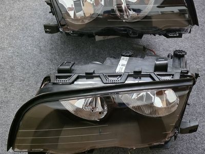 Headlight assembly 1999–2001 E46 BMW 3-Series - Eagle Eyes BM145-B101L (left) or B101R (Right)