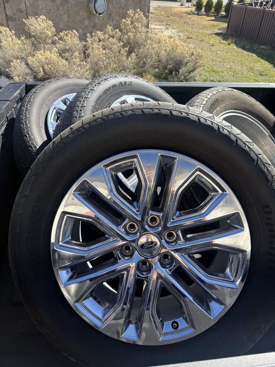 4 Ford factory Wheels and Tires
