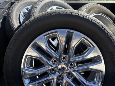 4 Ford factory Wheels and Tires