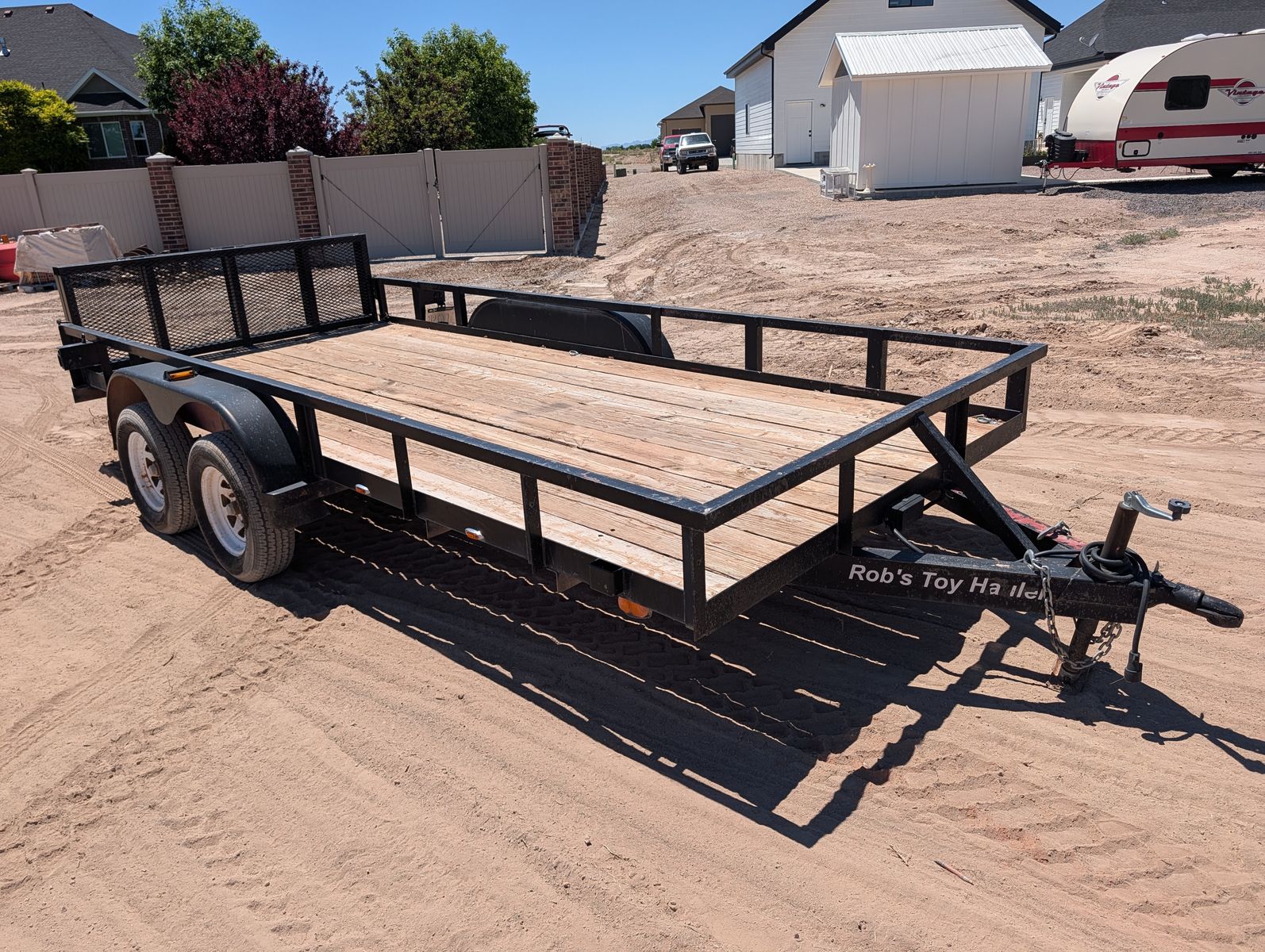 1997 Big Tex 16' Flatbed Utility Trailer - Dual Axle, Wood Deck, Bi-Fold Ramp