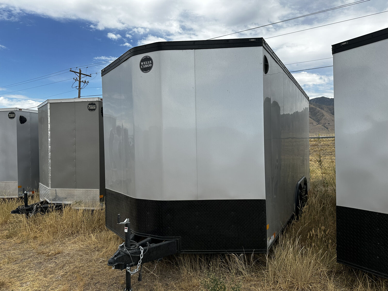 EXTRA HEIGHT 2025 WELLS CARGO ROAD FORCE 8.5 X 16