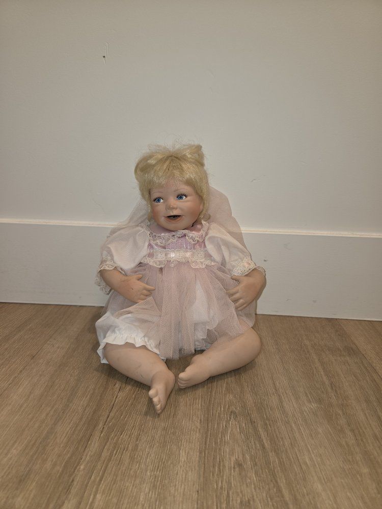 Vintage Porcelain Collectible Doll with Blonde Hair in Pink Lace Dress