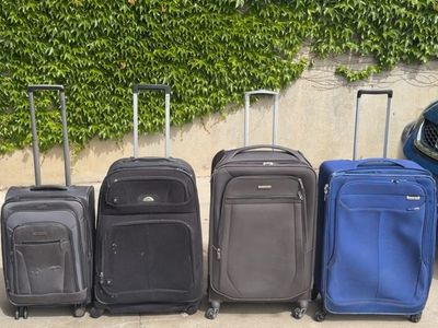 Samsonite suitcases carry on or medium
