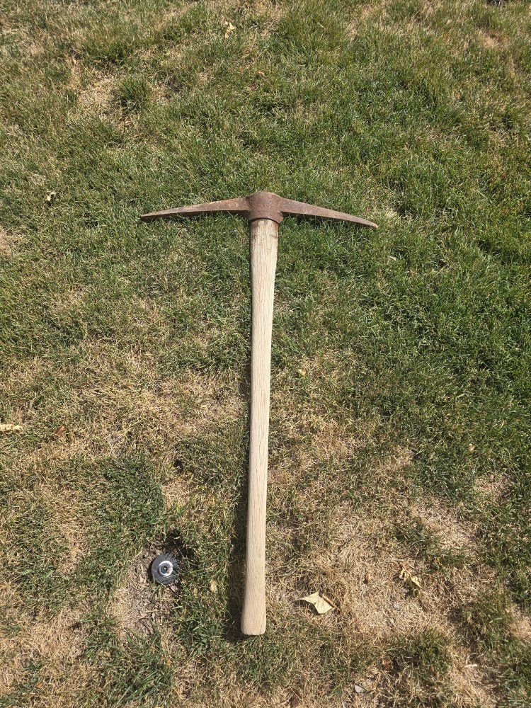 Durable Steel Vintage Pickaxe with Wooden Handle - Used Condition