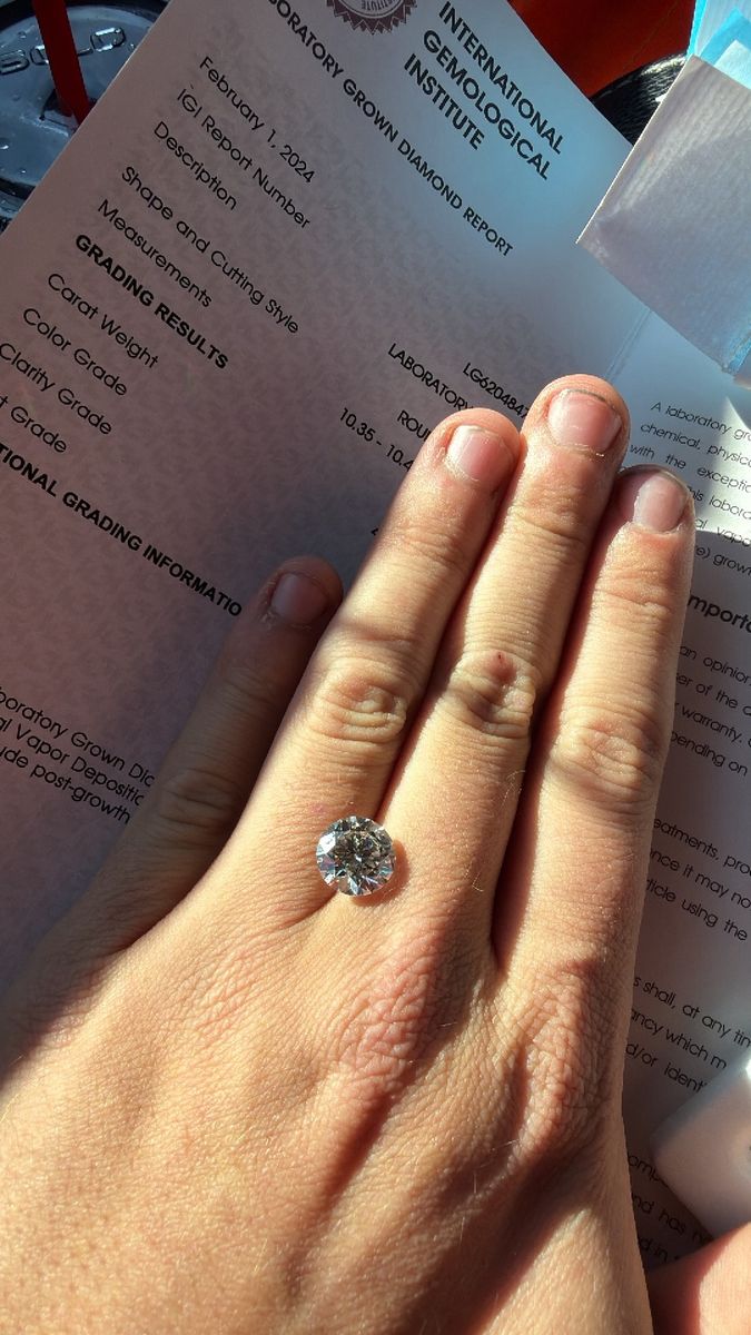 4.04 carat brilliant round cut lab grown diamond