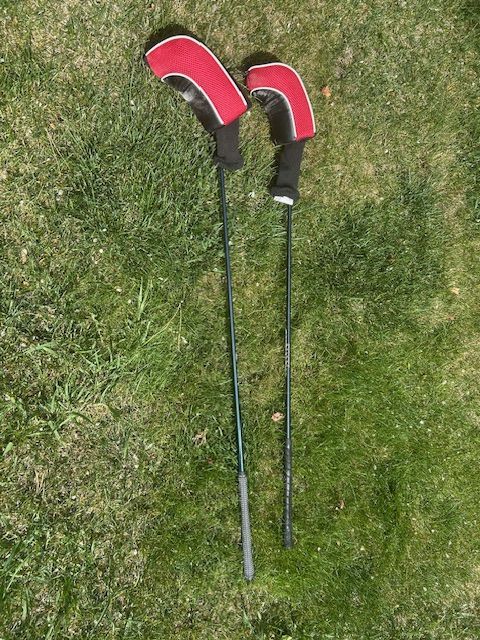 2 Golf Drivers with Reds Covers