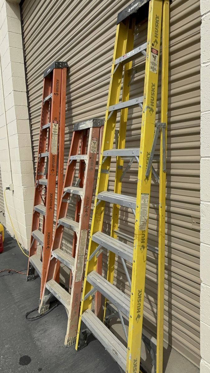 3 fiberglass husky ladders Worth $600+
