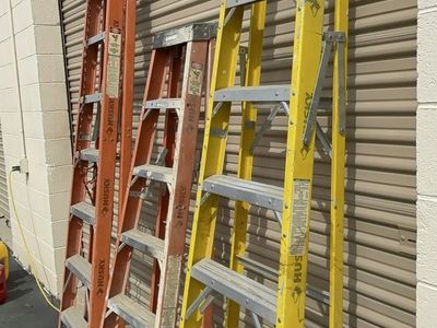 3 fiberglass husky ladders Worth $600+