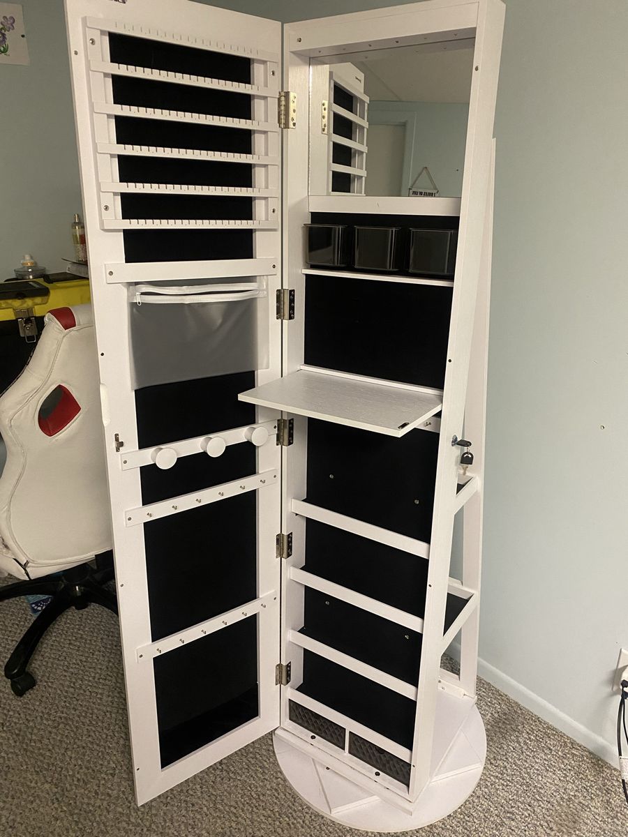 Rotating mirror/jewelry stand