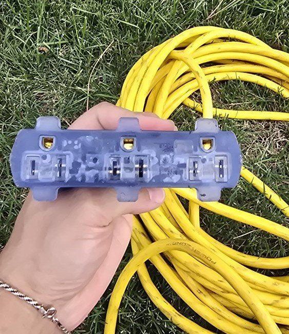 Power Zone Heavy Duty Yellow Outdoor Extension Cord with 3-Outlet Lighted Splitter End