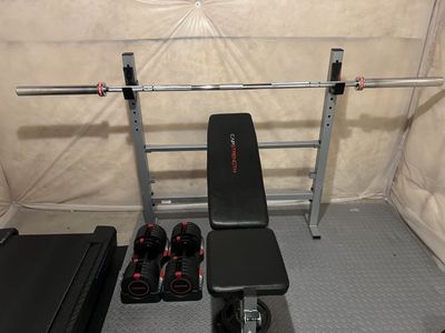 Weight Bench, Olympic Bar, and Weights