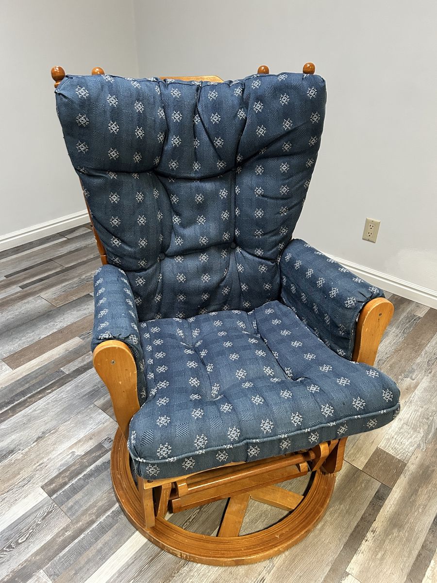 Glider Rocking chair in Good Condition has Blue Cushions