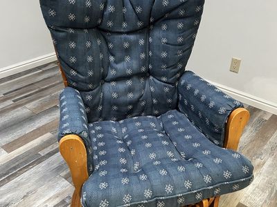 Glider Rocking chair in Good Condition has Blue Cushions