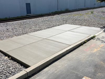Shed Pads | Driveway Extensions | Sidewalks | Retaining Walls | Waterproofing | Concrete | Butterfield Builders