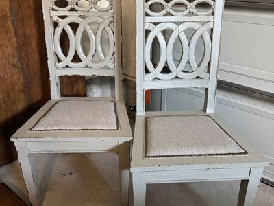 Set of 2 wood dining chairs. Durable textile Seat with bronze nailheads. These make a statement!