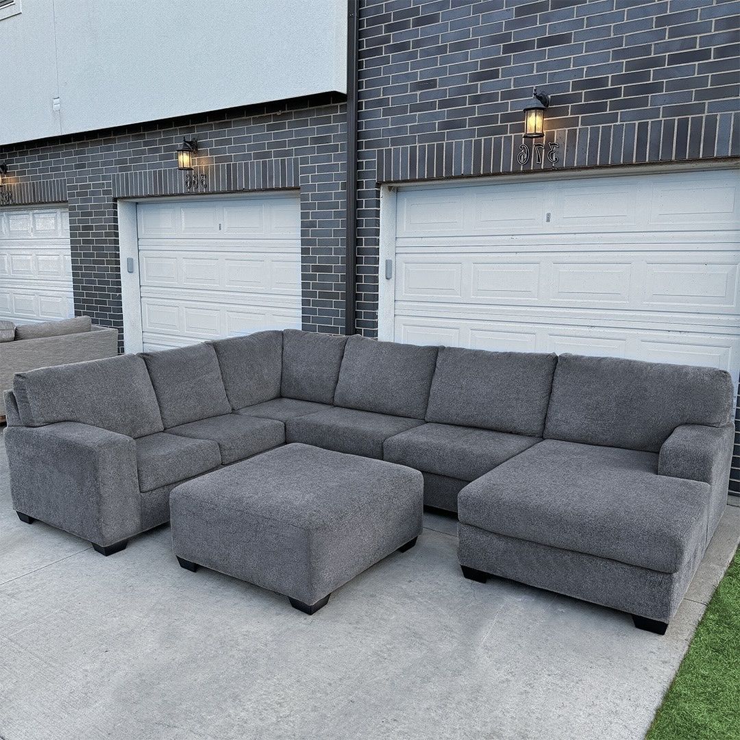 DELIVERY AVAILABLE - Dark Gray Sectional Couch w/ Ottoman
