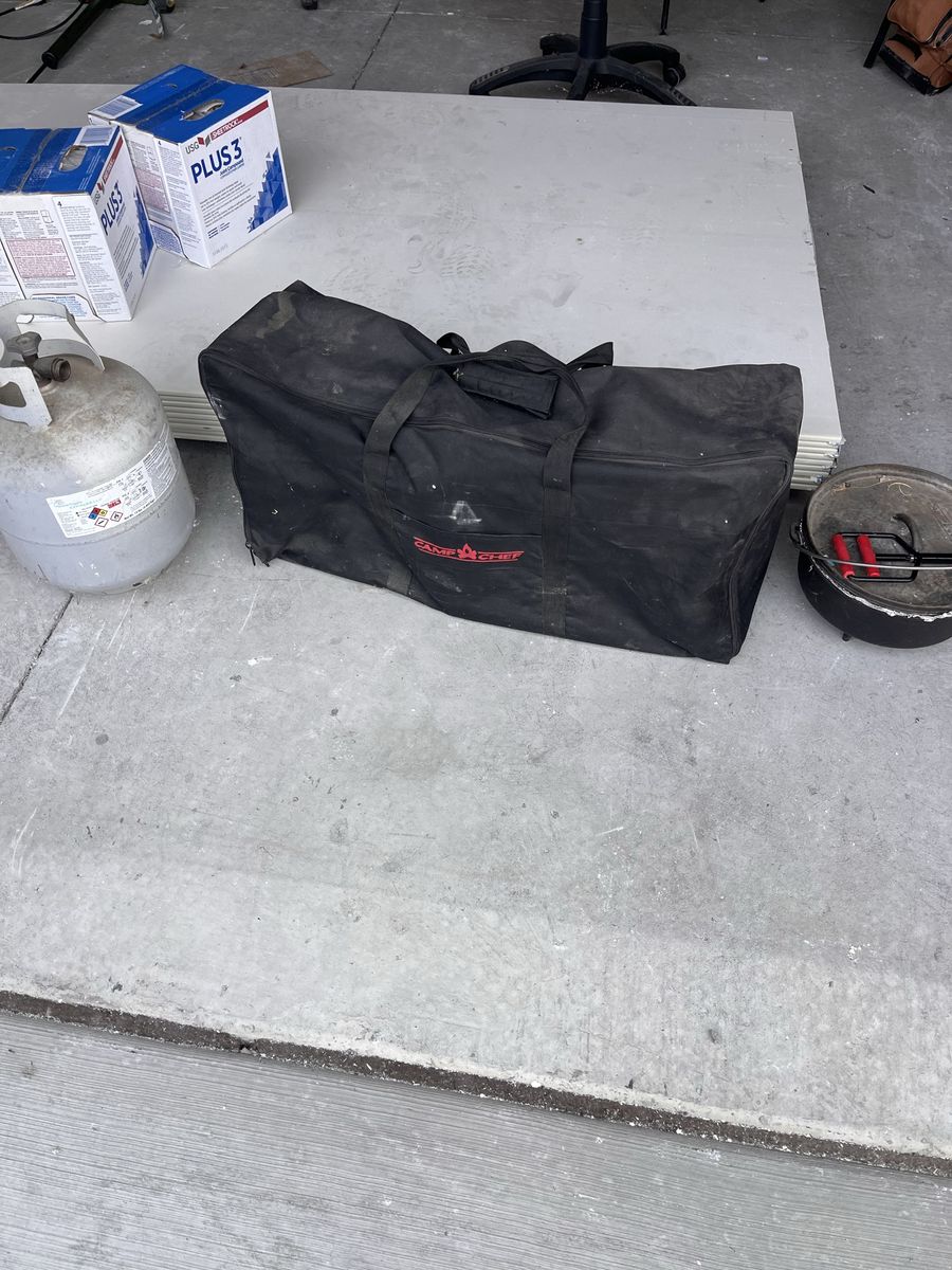 Camp Chef (two burner) with Dutch oven and propane tank