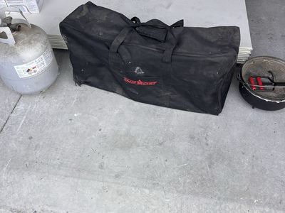 Camp Chef (two burner) with Dutch oven and propane tank