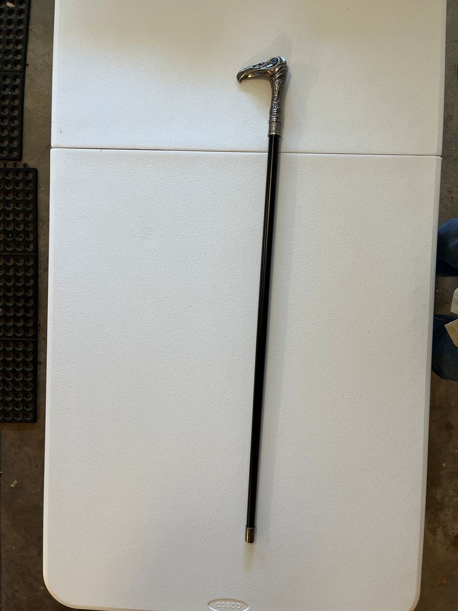 Cane that has a dagger  enclosed (attached to the handle)